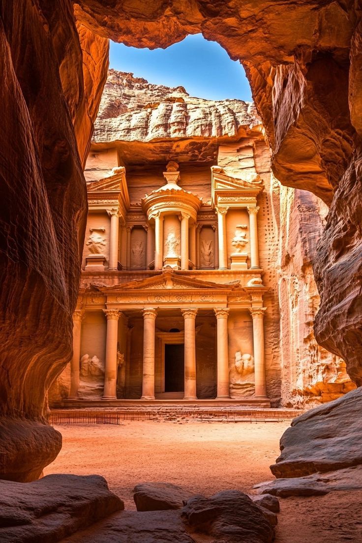 an ancient building in the middle of some rocks