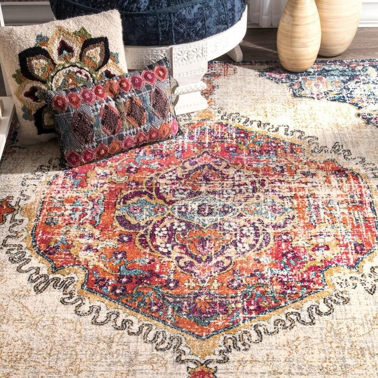 an area rug with many different colors and patterns