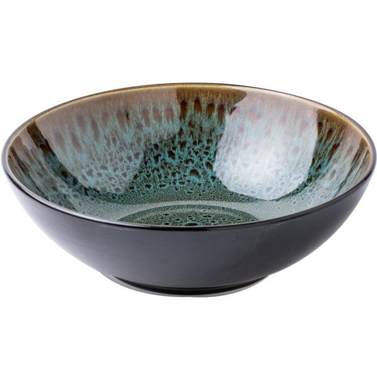 a black bowl with blue and white designs on it