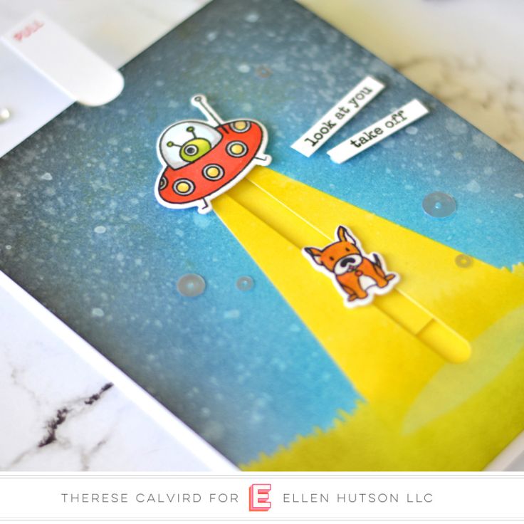 a close up of a card with an animal sticker on the top of it