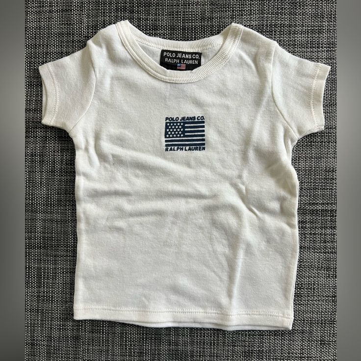 New Girls "Polo Jean Co., Ralph Lauren" Beige Tee Shirt, Flag Motif, Size: M 6-12 Months, Made In Mexico Old Money Tops, Preppy Fits, Halloween Long Sleeve, White Polo Shirt, Adidas Girl, Polo Jeans, Ralph Lauren Shirt, Fit Inspo, Mens Graphic Tee