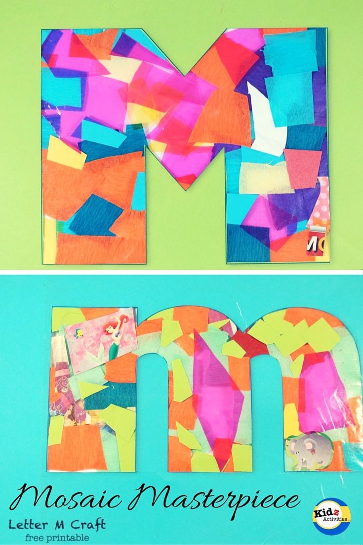 the letter m is made out of construction paper and then cut into smaller pieces to make it