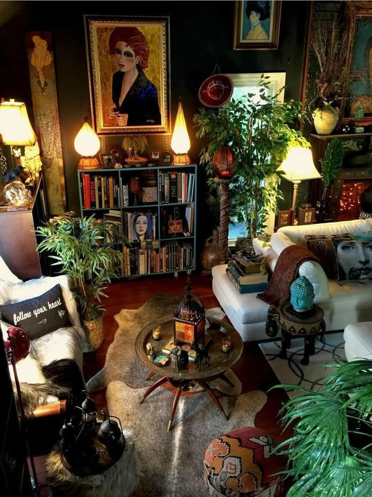 a living room filled with furniture and lots of plants