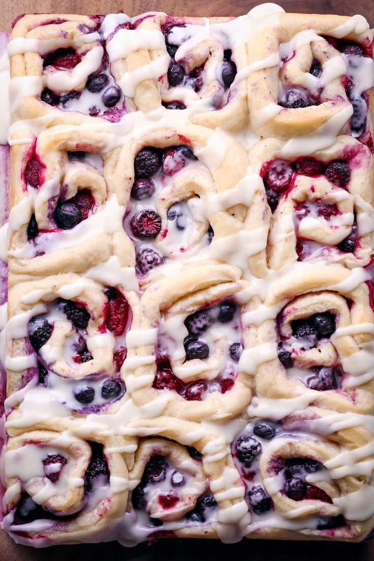 blueberry pretzels with icing on a cutting board