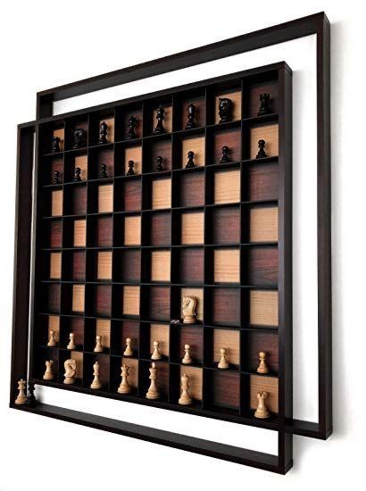 a wooden chess board mounted to the wall