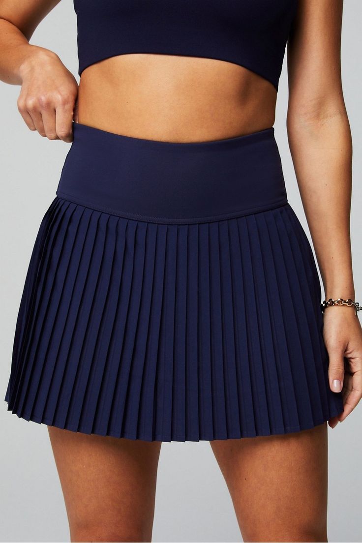 Hot Shot Pleated Skirt Fabletics blue female Activewear >> Womens >> Bottoms >> Skirts regular Everyday/Tennis Hidden Pockets/Moisture-Wicking Navy Stretch Tennis Skirt For Summer, Fitted Blue Skirt With Wide Waistband, Fitted Blue Tennis Skirt For Sports, Sporty Fitted Blue Skirt, Blue Stretch Skirt With Wide Waistband, Fitted Navy Tennis Skirt For Spring, Navy Pleated Bottoms For Summer, Navy Pleated Skort For Summer, Blue Fitted Sporty Skirt