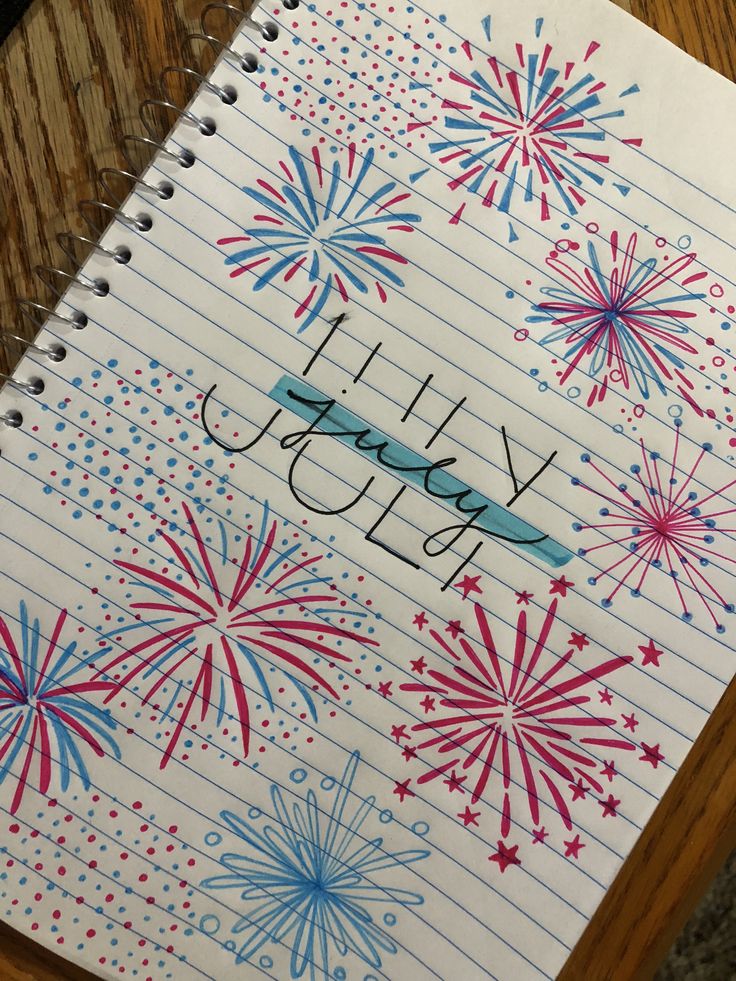 a notebook with fireworks on it that says happy july