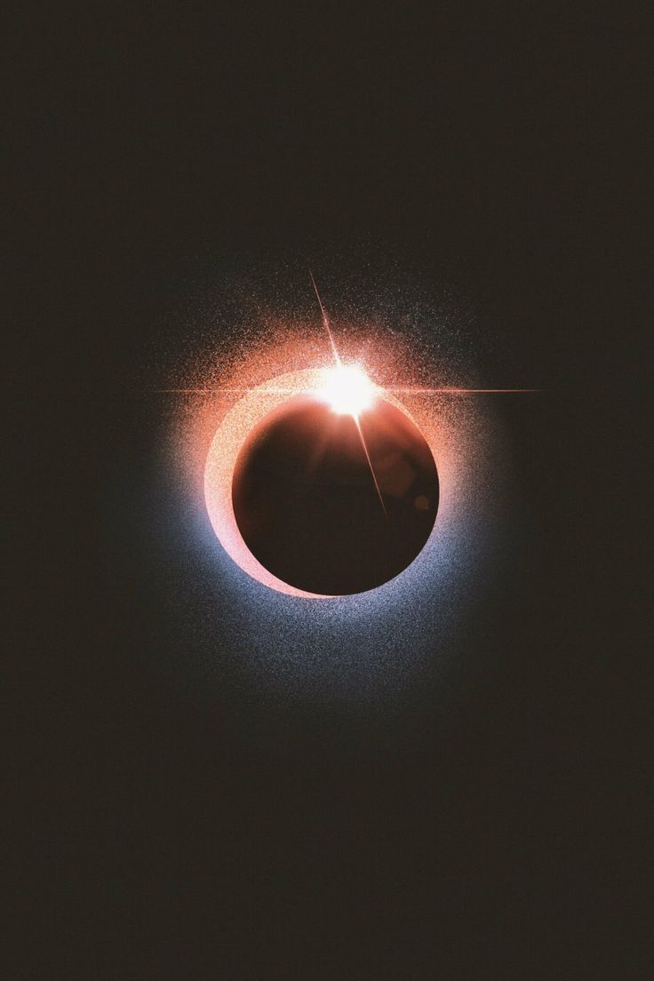 the sun's shadow is seen in front of an eclipse