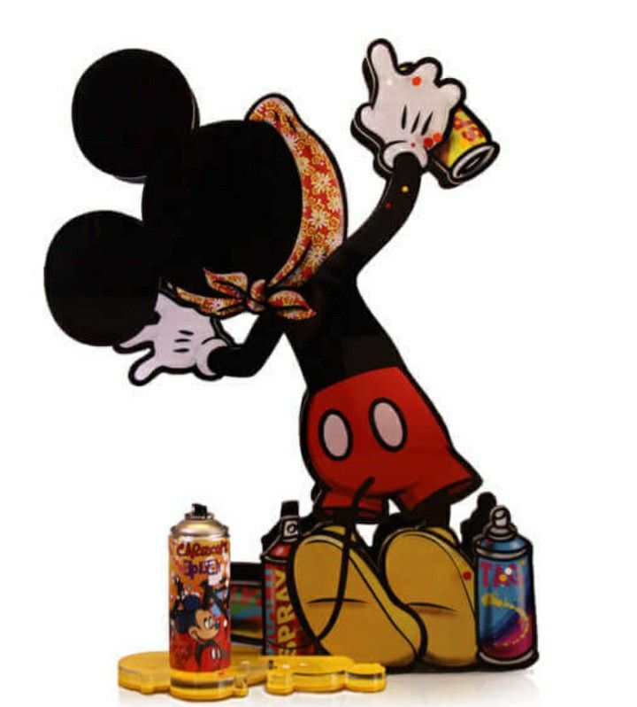 the mickey mouse is holding up a beer