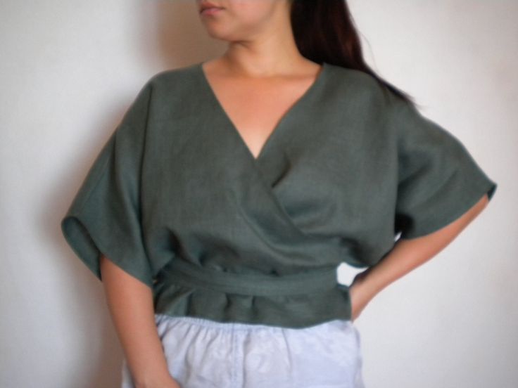 Women`s linen shirt, wrap layering top, half sleeve linen blouse, V neck plus size wrap top. Beautiful and very comfy wrap linen top, so feminine, simple, stylish and super versatile. This top has v neck with a double layered front and comfortable elegant look. Belt straps can be tied in the front, back or on the side. It is made of quality pure linen. You can choose another color from the last picture. Size chart: SIZE XS(US 0-2, UK 6-8, Italian 36-38, French 32-34) bust: fits bust around 32.5" Spring Tops With Kimono Sleeves And Relaxed Fit, Spring Tops With Relaxed Fit And Kimono Sleeves, Relaxed Fit Tops With Kimono Sleeves For Spring, Casual Linen Wrap Top For Summer, Casual Green Wrap Top, Summer Tops With Relaxed Fit And Kimono Sleeves, Relaxed Fit Top With Kimono Sleeves For Summer, Green Linen Bohemian Top, Green Bohemian Linen Top