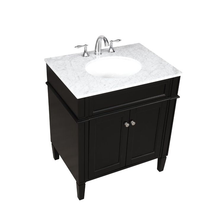 a white sink sitting underneath a black cabinet