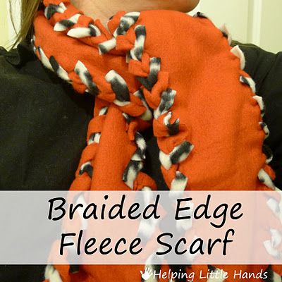 a woman wearing an orange scarf with black and white designs on it, text reads braided edge fleece scarf helping little hands