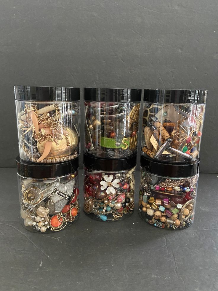 Open your own mixed lot jewelry jar. You will receive one jar with 14-18 pieces in the jar. The jar includes a mix of necklaces, bracelets, earrings, rings, and brooches from vintage to now. All are wearable items with no broken or missing parts or missing stones. The jar is a sparkly plastic for safety sake, and to reduce shipping. The jars are fun for you to add to your jewelry wardrobe or for girlfriend getaways, bridesmaids parties  bachelorette parties or just fun to open with family and friends. No returns or accepted on these items. Mystery Jewelry Jar, Bridesmaid Party Bachelorette, Girlfriends Getaway, Jewelry Wardrobe, Bridesmaid Party, Bachelorette Parties, Earrings Rings, Now Open, Bachelorette Party