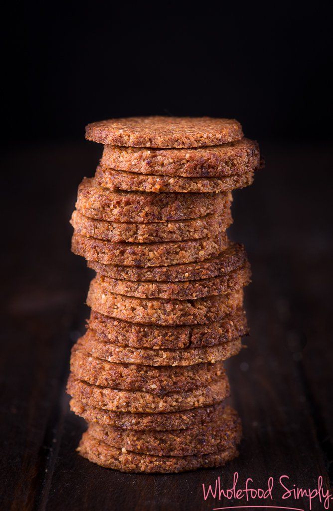 a stack of cookies sitting on top of a wooden table