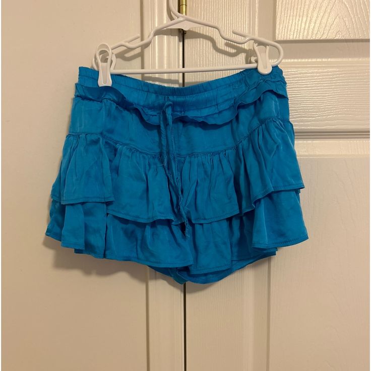 Blue Mini Skirt || Never Worn || Size: Xs || Blue Tiered Skirt For Day Out, Blue Mini Skirt Bottoms For Summer, Blue Tiered Mini Skirt For Vacation, Blue Skirt For Day Out, Light Blue Tiered Skirt For Vacation, Blue Skirted Bottoms For Vacation, Casual Blue Skirted Shorts, Blue Summer Skirt, Short Blue Skirt For Summer