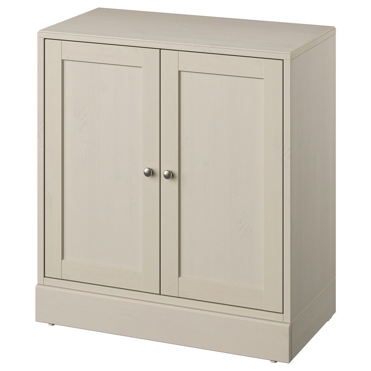 a white cabinet with two doors on the front