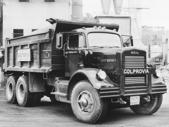 an old black and white photo of a large truck