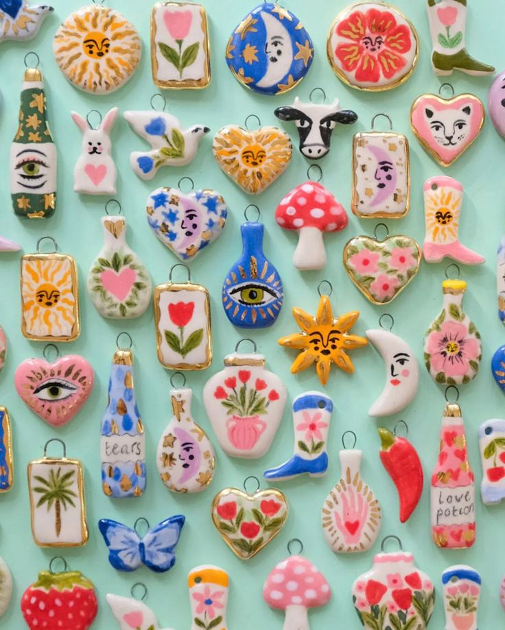 many decorated cookies are arranged on a table