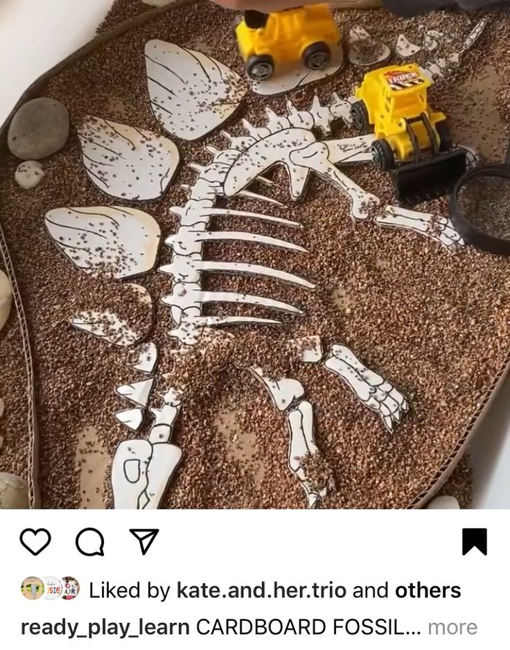 someone is working on a skeleton with construction toys in front of it and an image of a truck