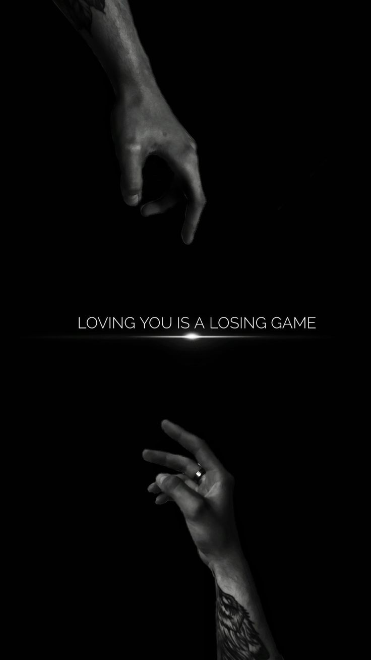 two hands reaching towards each other with the words loving you is a losing game