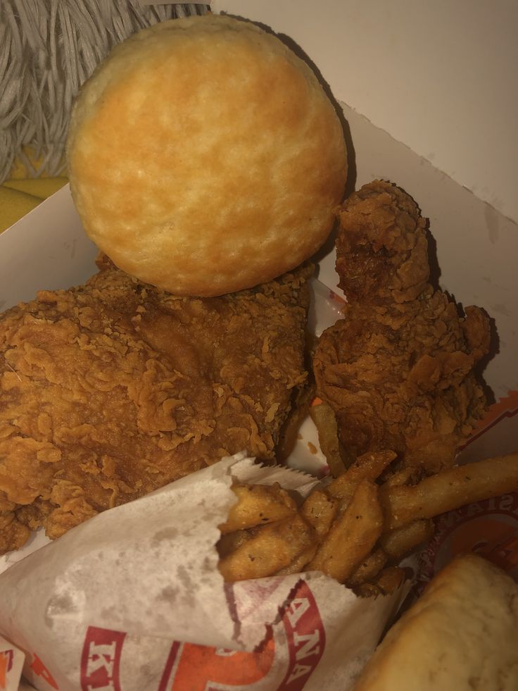 fried chicken and french fries in a box