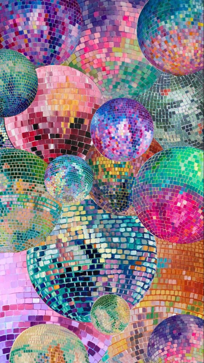 many colorful disco balls are arranged in the shape of a mosaic tile pattern on a wall