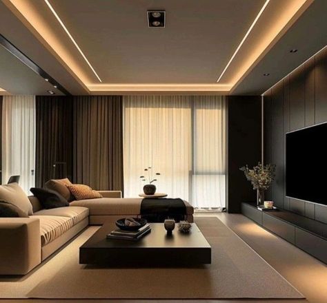 a living room with couches, tables and a television on the wall in it