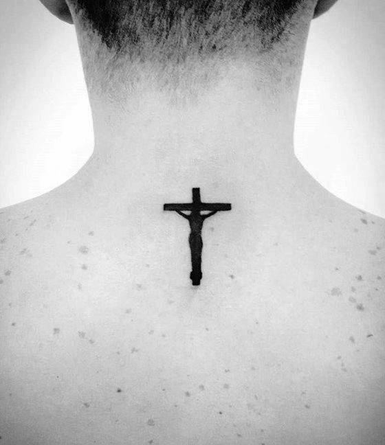 a man with a cross tattoo on his back