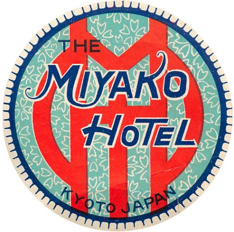 the logo for the tokyo hotel is shown in red, blue and green colors on a white background