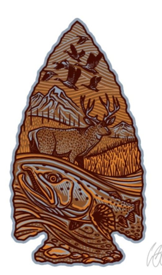 a sticker with an image of a fish and mountains