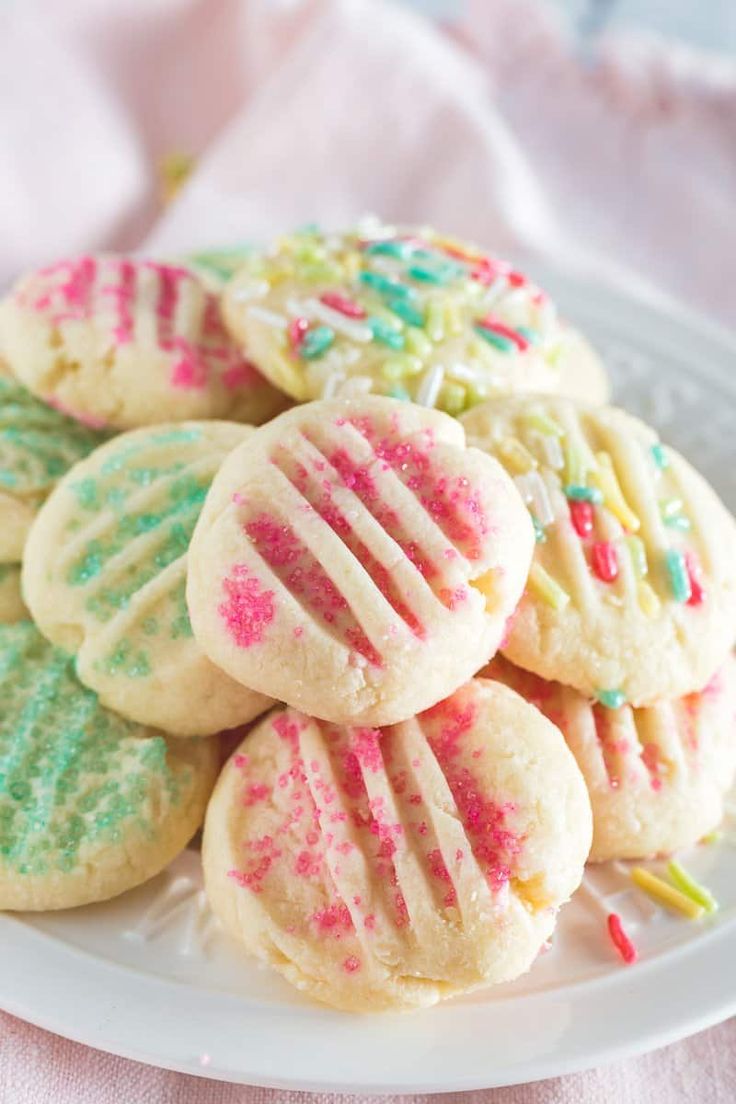 easter shortbread cookies with sprinkles on a plate