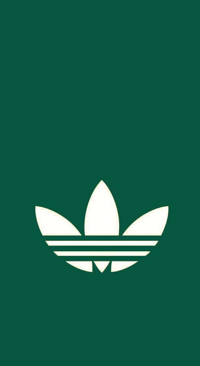 the adidas logo on a green background