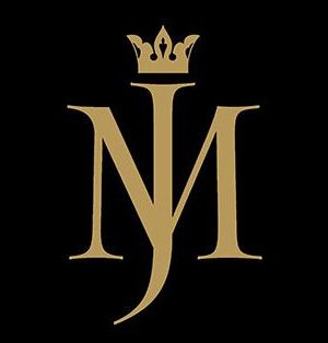 the letter m with a crown on top is shown in this black and white photo