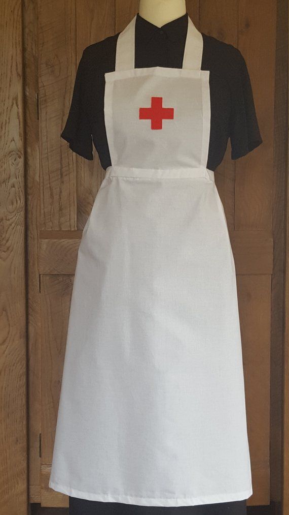 Handcrafted Red Cross style adult World War I Nurse apron uniform, material: 100 % cotton A white apron with the Red Cross emblem displayed on the bib,Long waist straps to fit various sizes.  skirts part length: 28 inch  Ideal for history days, WW1 day, World book day, WWI Nurse Apron, Nurse Fancy Dress, Apron Uniform, Maid Hat, Maid Fancy Dress, Sparkles Dress, Gothic Wedding Theme, White Victorian, Nurse Costume