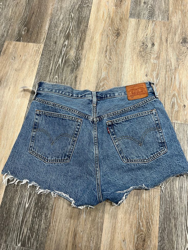 Brand: LEVIS Style: SHORTS Color: DENIM BLUE Size: 12/31SKU: 137-13745-279527 CONDITION: GENTLY USED Blue Jeans With Frayed Hem Short Leg, Blue Denim Cutoff Bottoms, Levis Style, Style Shorts, Levi Shorts, Denim Blue, Christmas List, Blue Denim, Dark Blue