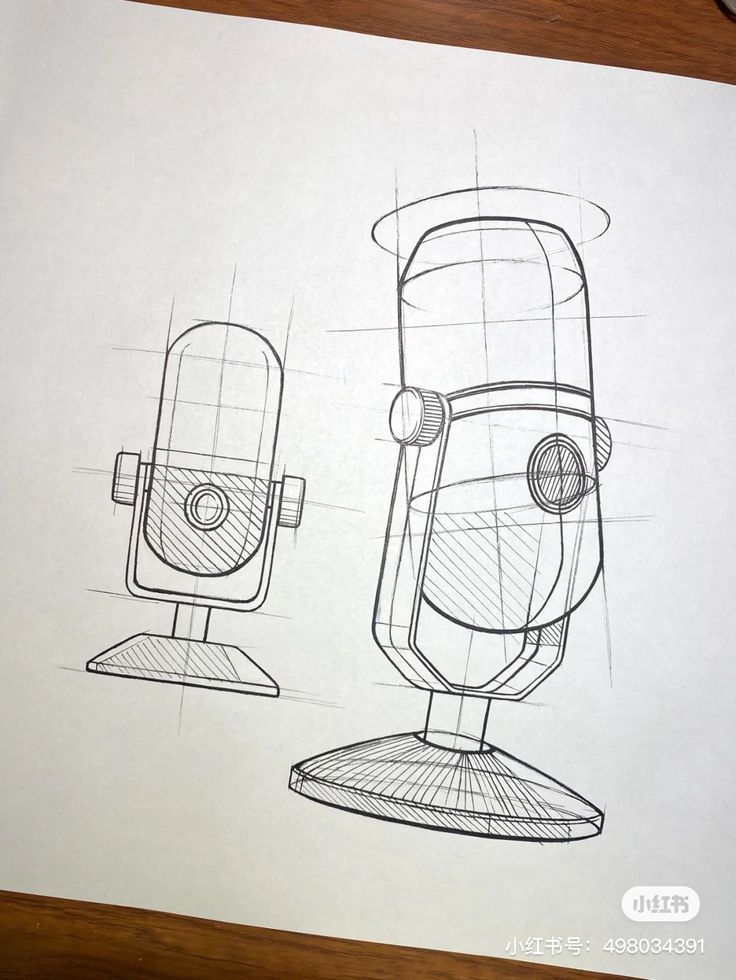 a drawing of two microphones sitting on top of each other next to each other