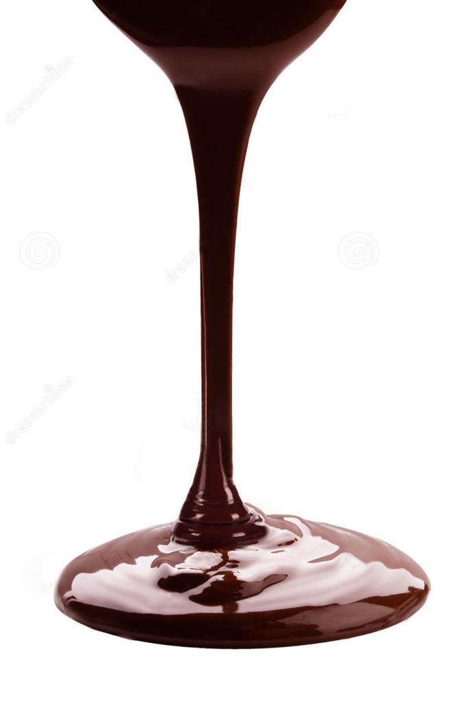 chocolate sauce in a wine glass on a white background stock photo image and royalty photography