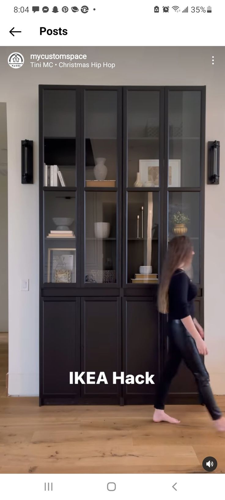 a woman is walking in front of a bookcase with the words ikea hack on it