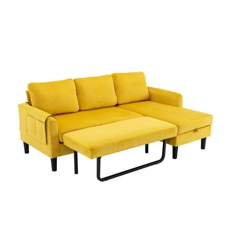 a yellow couch and ottoman sitting next to each other