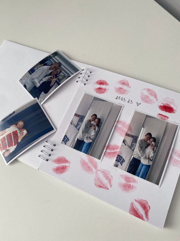 an open photo book with pictures of people and lipstick imprints on it