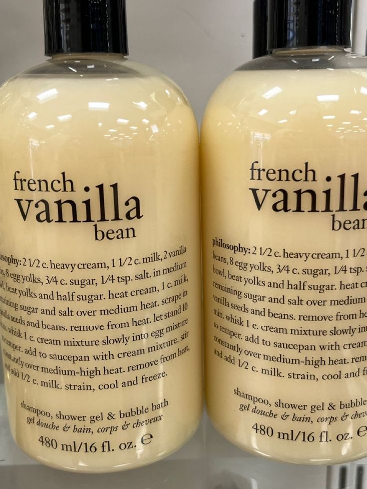 two bottles of french vanilla soap sitting on top of a shelf next to each other