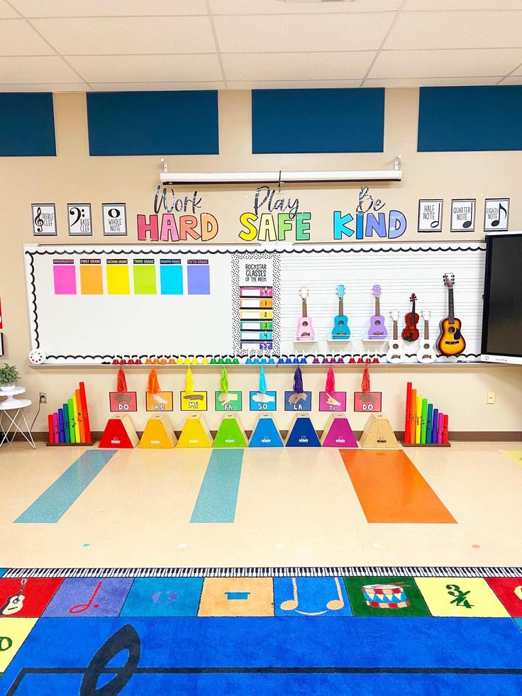 a classroom with colorful rugs and toys on the floor