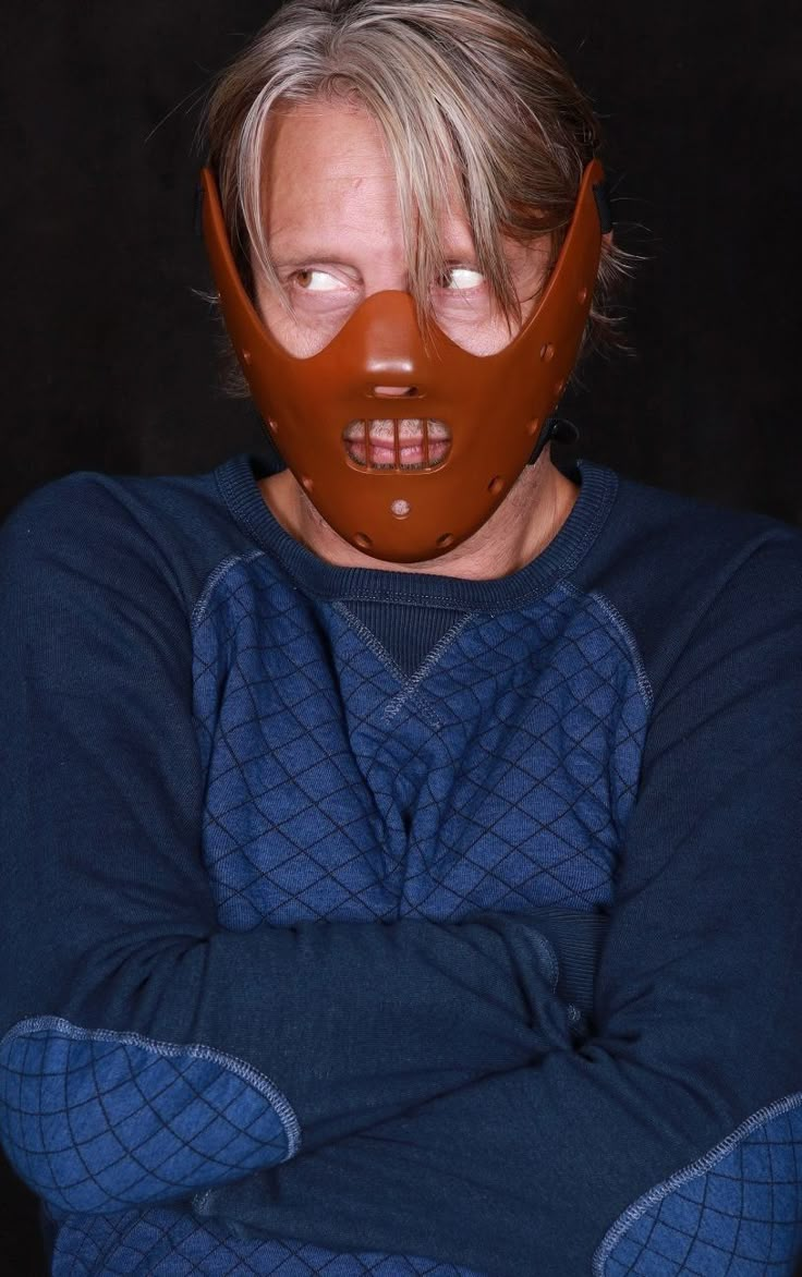 a person with a mask on their face