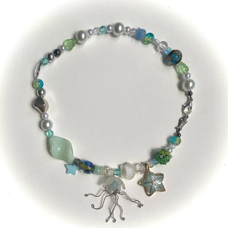 Jellyfish Necklace Diy, Jellyfish Jewelry Necklace, Ocean Inspired Necklace, Ocean Necklace Aesthetic, Ocean Aesthetic Jewelry, Necklace Ideas Aesthetic, Ocean Jewelry Aesthetic, Jellyfish Beads, Jellyfish Bracelet