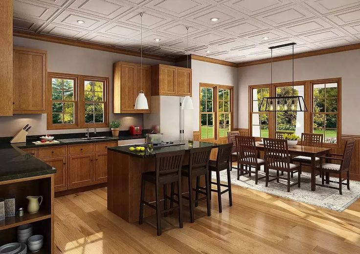 a large kitchen with wooden cabinets and an island