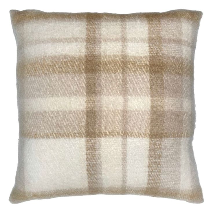 a brown and white plaid pillow on a white background