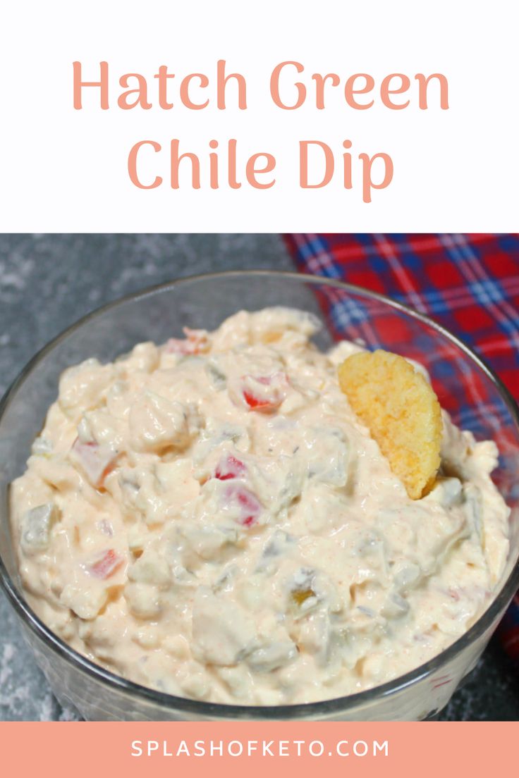 a bowl filled with potato salad next to a red and white checkered napkin on the side