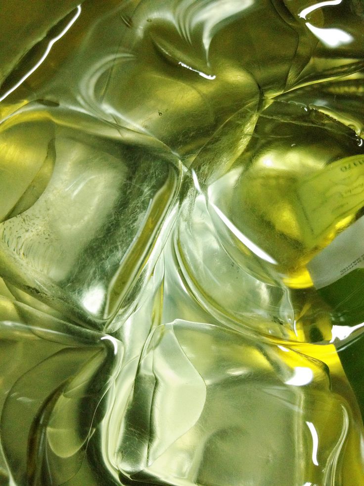 an image of ice cubes with yellow liquid in it