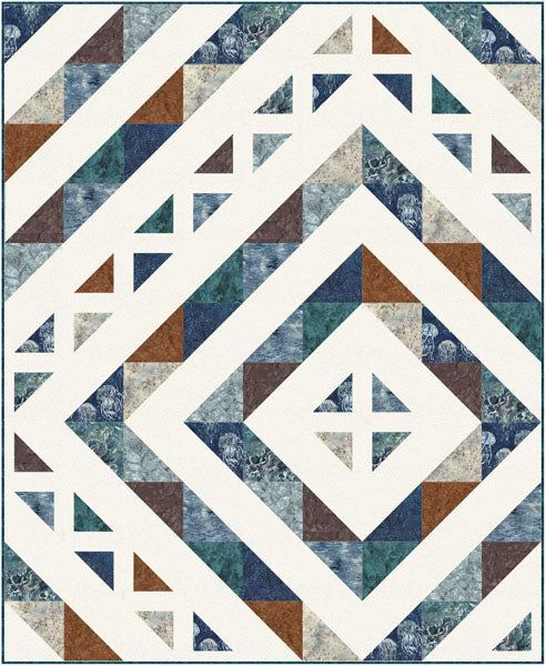 a blue and brown quilt with an abstract design on it's back side, in the shape of a diamond