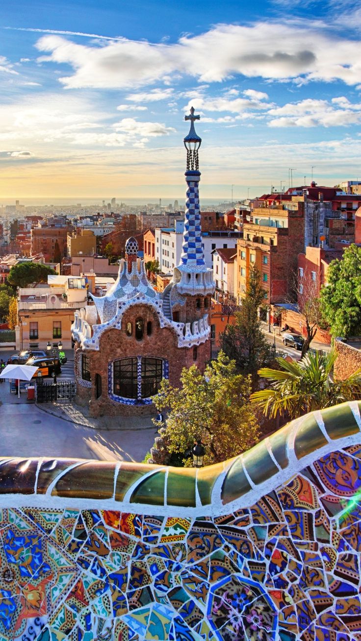 an aerial view of barcelona, spain with the park guell in the foreground